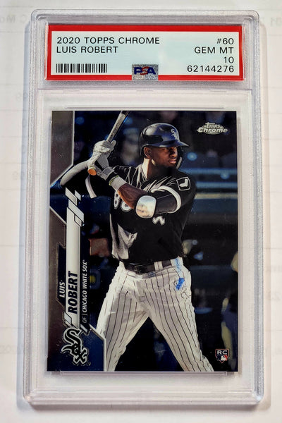 A PSA graded 2020 Topps Chrome baseball card of Luis Robert, showing him batting in a black and white Chicago White Sox uniform, encapsulated in a clear plastic grading holder.
