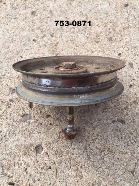 753-0871 Idler Pulley w/ bolt & nut *used*.  Bearing not great but turns ok.